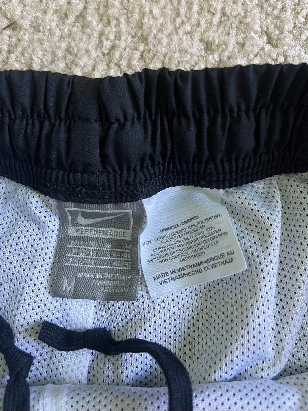 Nike Black Athletic Shorts with White Side Panels